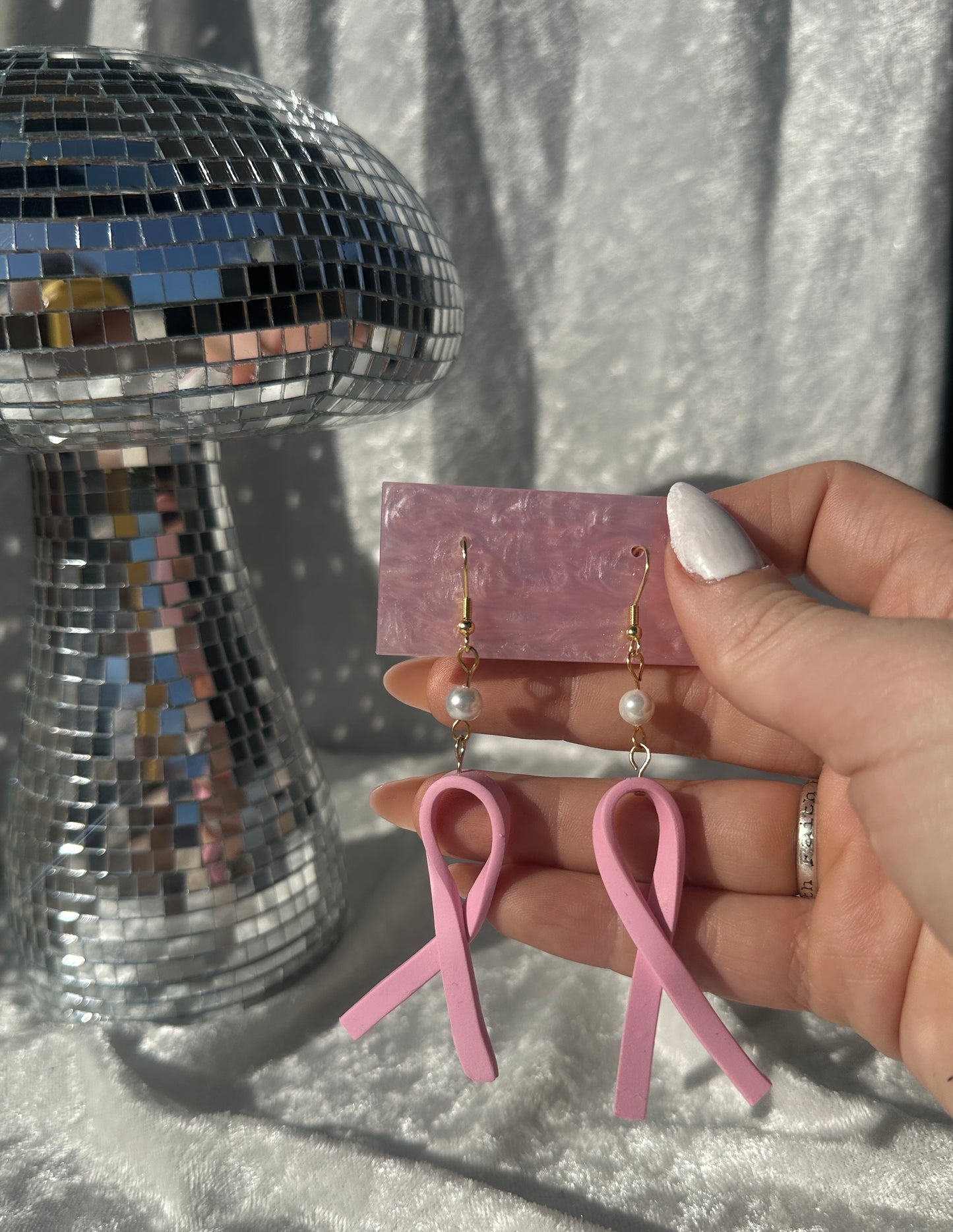 Pink ribbon statement earrings