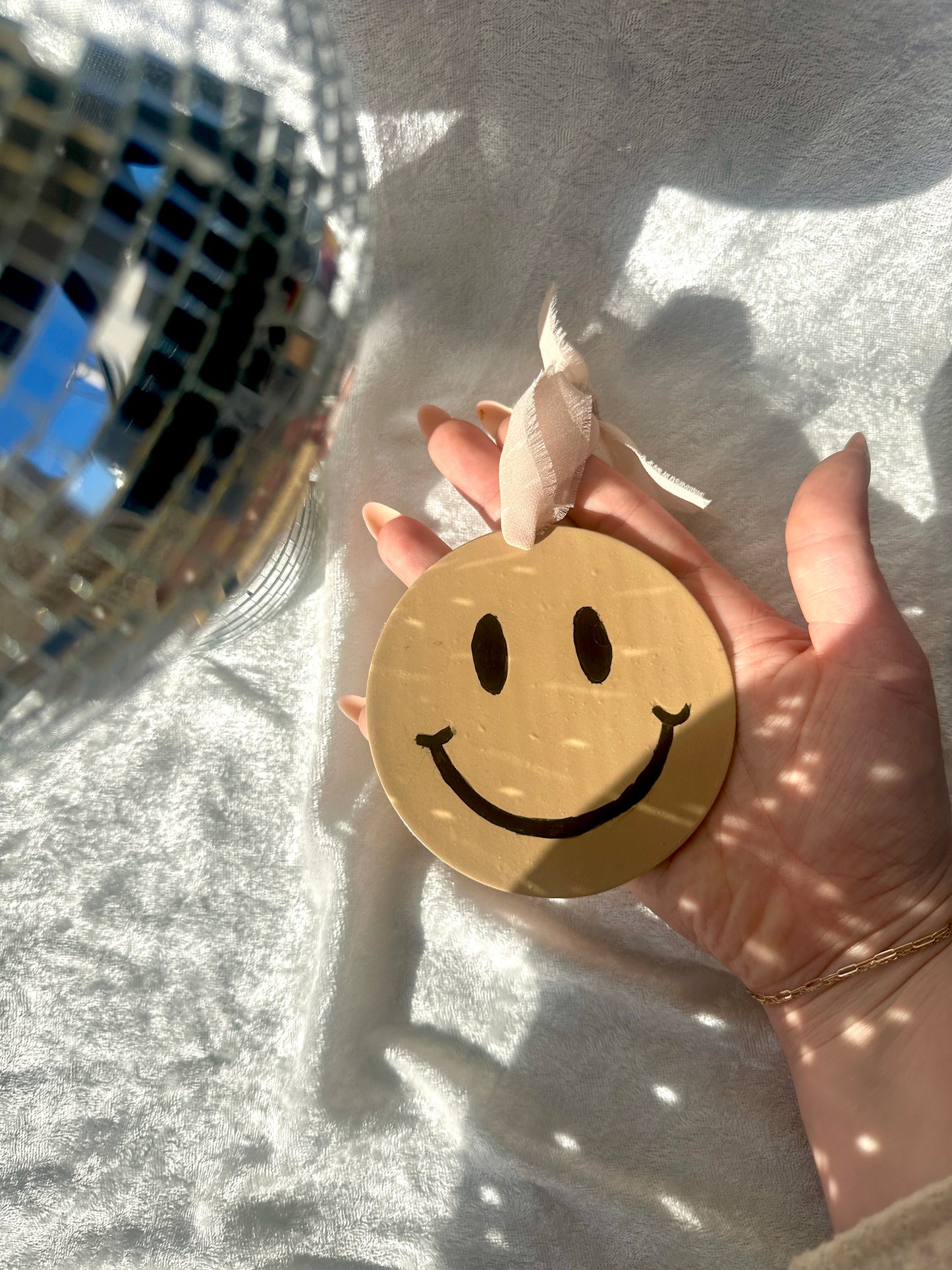 Smiley face wall hanging