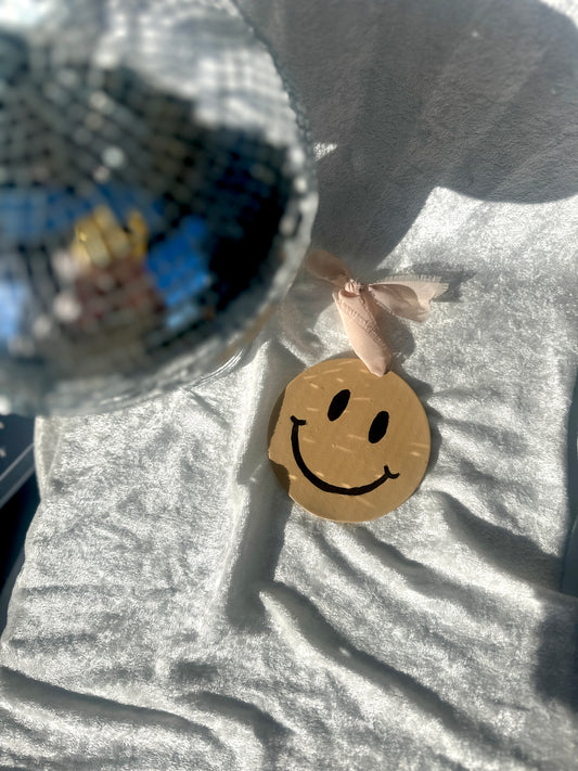 Smiley face wall hanging